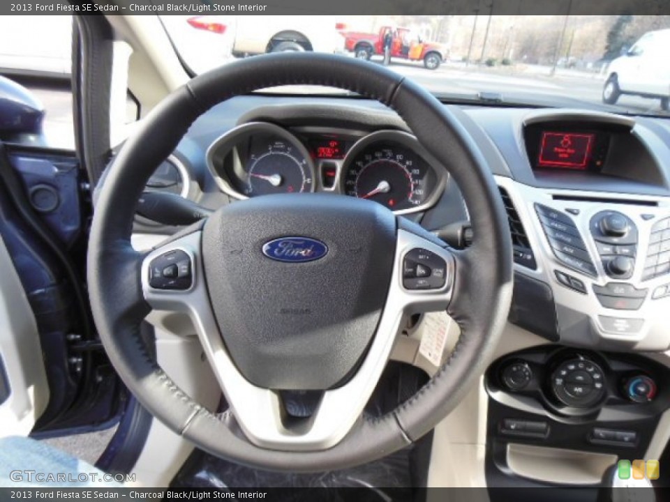 Charcoal Black/Light Stone Interior Steering Wheel for the 2013 Ford Fiesta SE Sedan #74487872