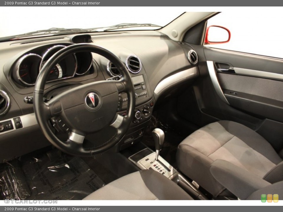 Charcoal Interior Prime Interior for the 2009 Pontiac G3  #74503757