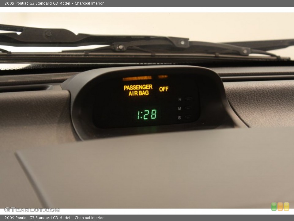 Charcoal Interior Controls for the 2009 Pontiac G3  #74503798