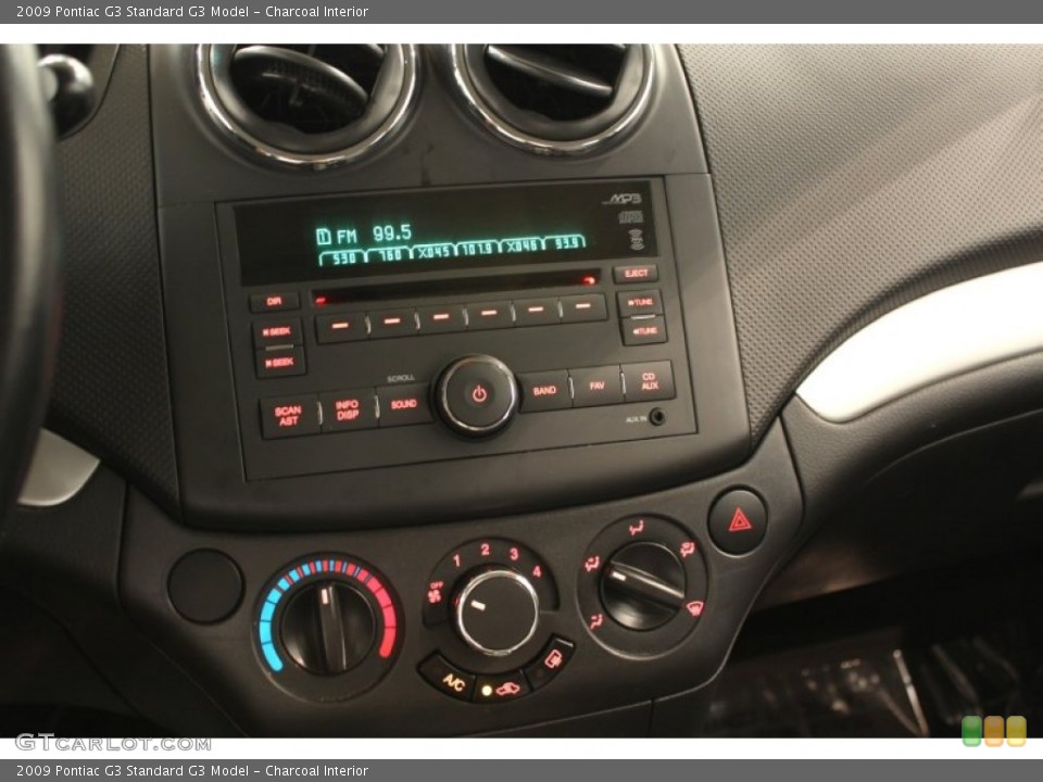Charcoal Interior Controls for the 2009 Pontiac G3  #74503840