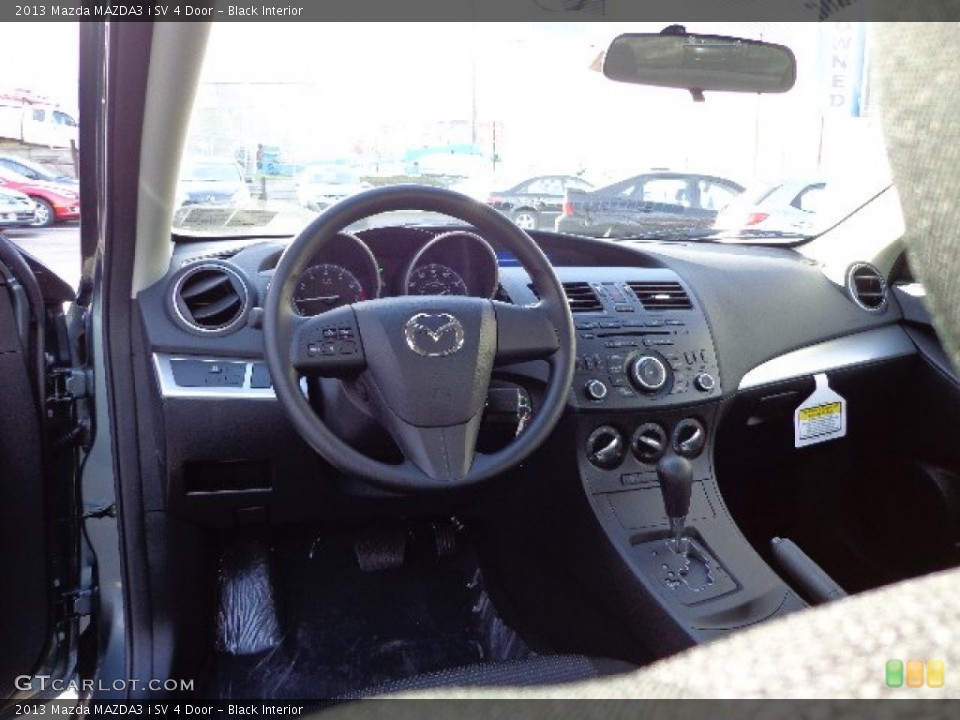 Black Interior Dashboard for the 2013 Mazda MAZDA3 i SV 4 Door #74523878