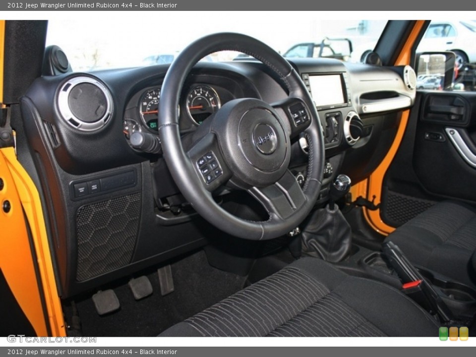 Black Interior Dashboard for the 2012 Jeep Wrangler Unlimited Rubicon 4x4 #74553197
