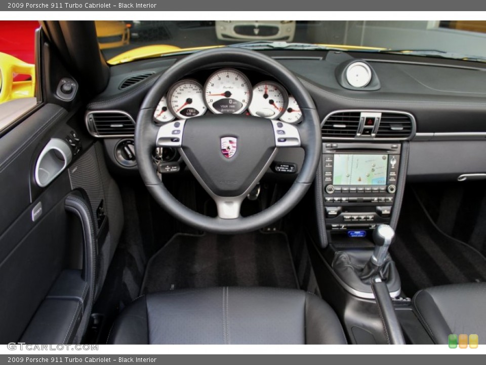 Black Interior Dashboard for the 2009 Porsche 911 Turbo Cabriolet #74559584