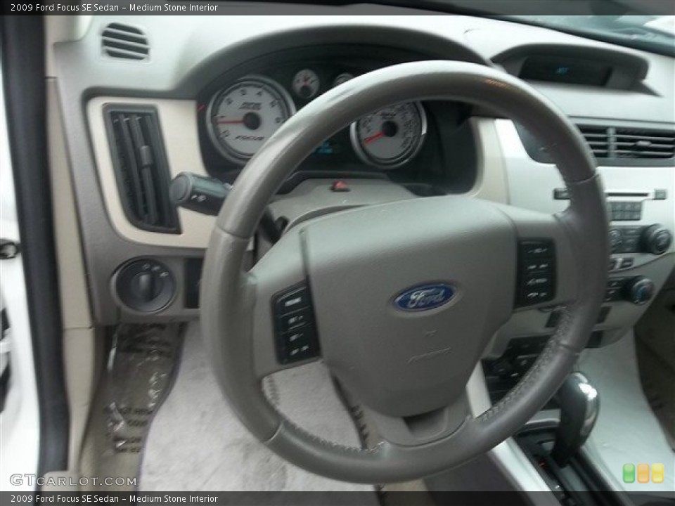 Medium Stone Interior Steering Wheel for the 2009 Ford Focus SE Sedan #74563320