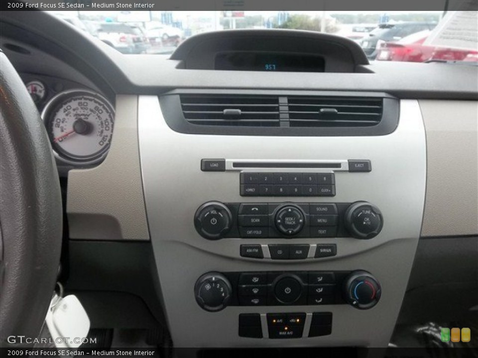 Medium Stone Interior Controls for the 2009 Ford Focus SE Sedan #74563335