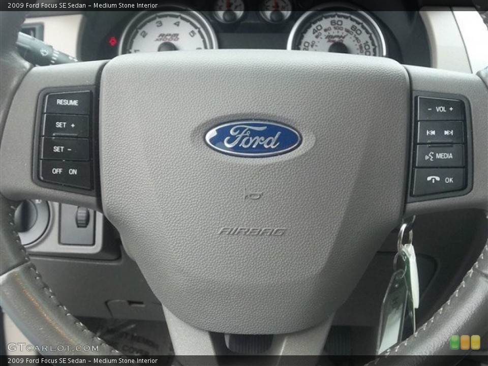 Medium Stone Interior Controls for the 2009 Ford Focus SE Sedan #74563375