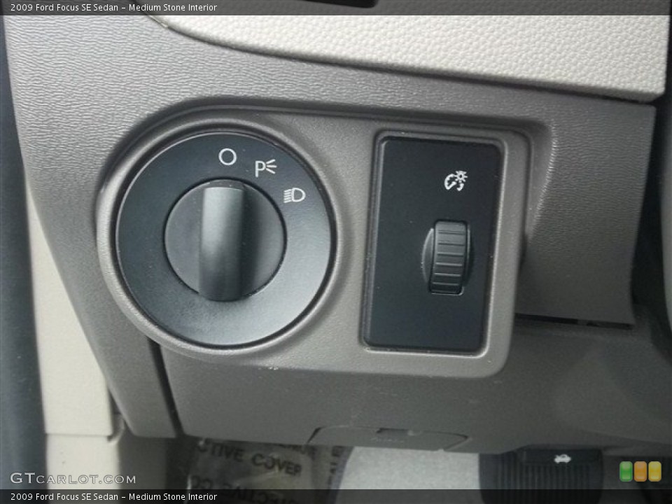 Medium Stone Interior Controls for the 2009 Ford Focus SE Sedan #74563389