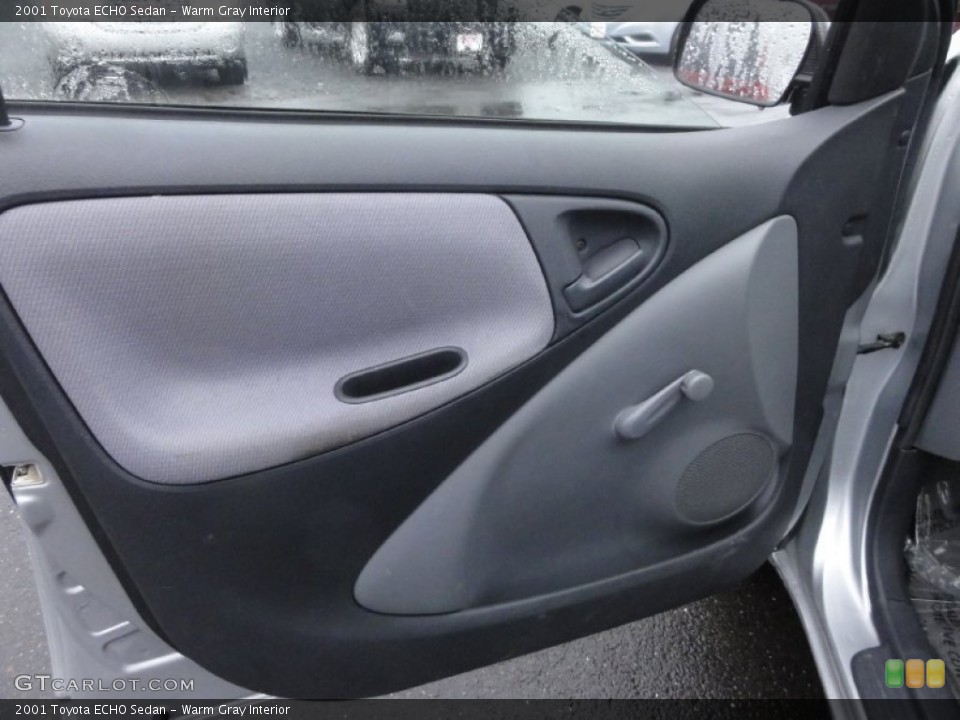 Warm Gray Interior Door Panel for the 2001 Toyota ECHO Sedan #74576836