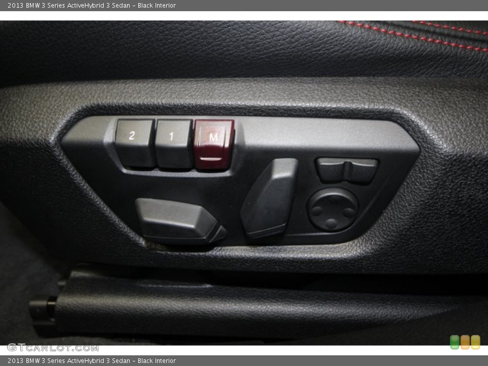 Black Interior Controls for the 2013 BMW 3 Series ActiveHybrid 3 Sedan #74585404