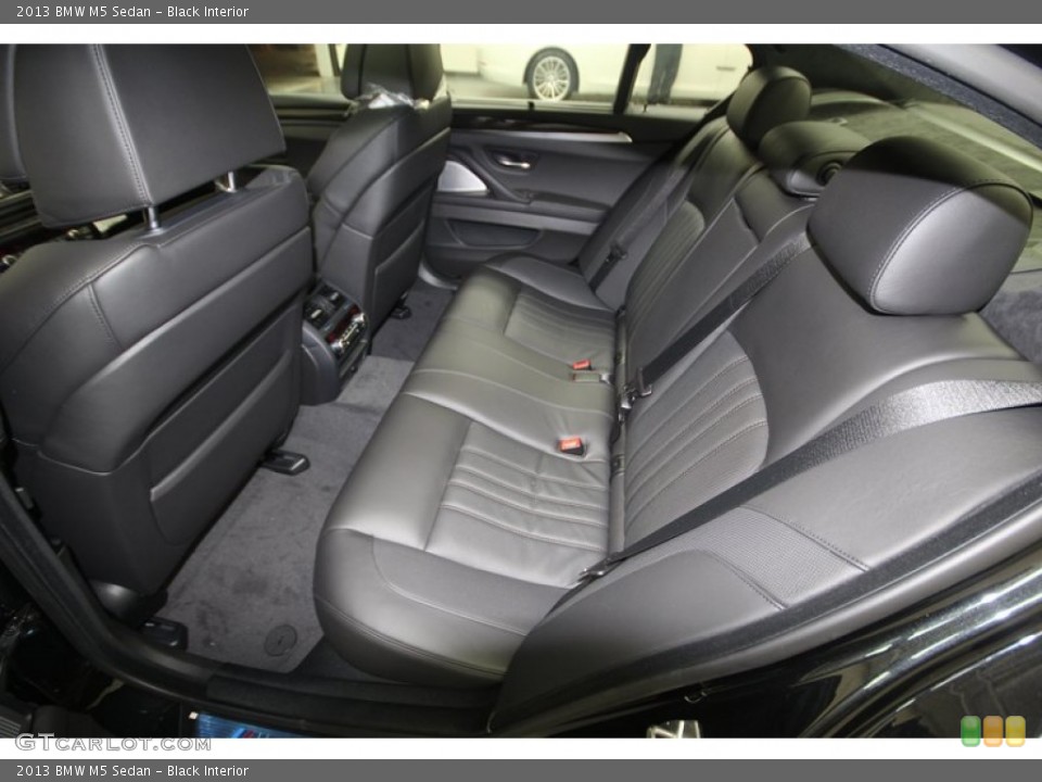 Black Interior Rear Seat for the 2013 BMW M5 Sedan #74588183