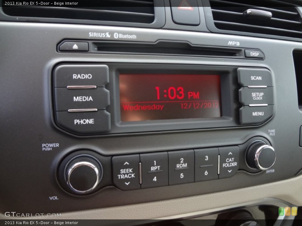 Beige Interior Audio System for the 2013 Kia Rio EX 5-Door #74626719