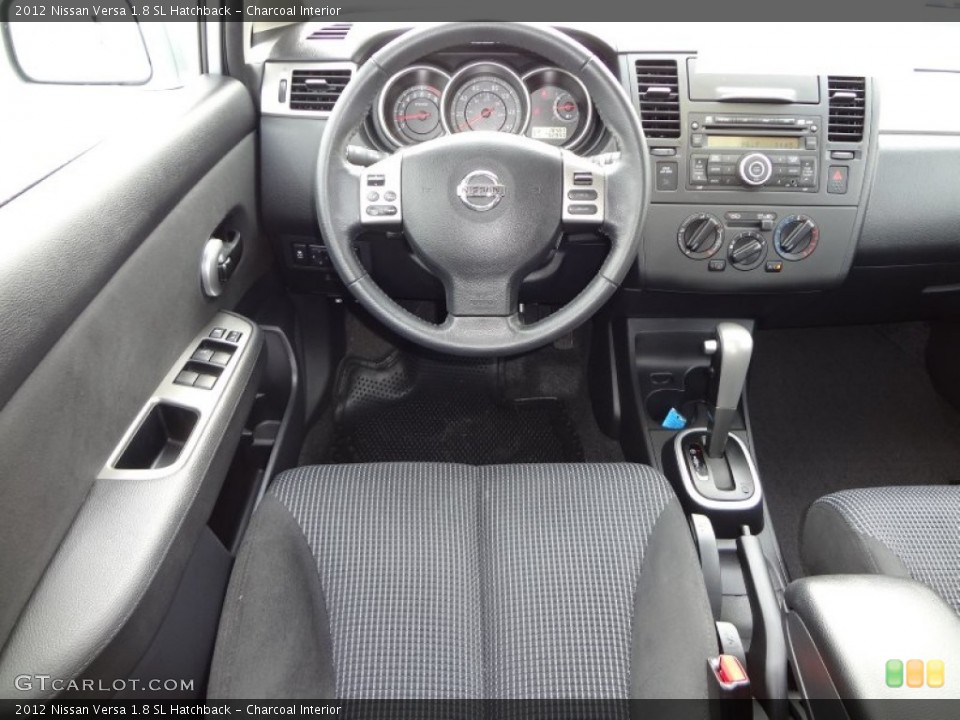 Charcoal Interior Dashboard for the 2012 Nissan Versa 1.8 SL Hatchback #74626917