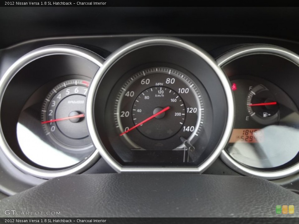 Charcoal Interior Gauges for the 2012 Nissan Versa 1.8 SL Hatchback #74627277