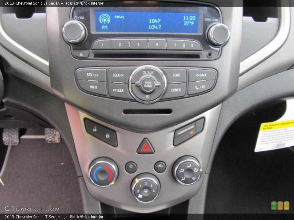 Jet Black/Brick Interior Controls for the 2013 Chevrolet Sonic LT Sedan #74636007