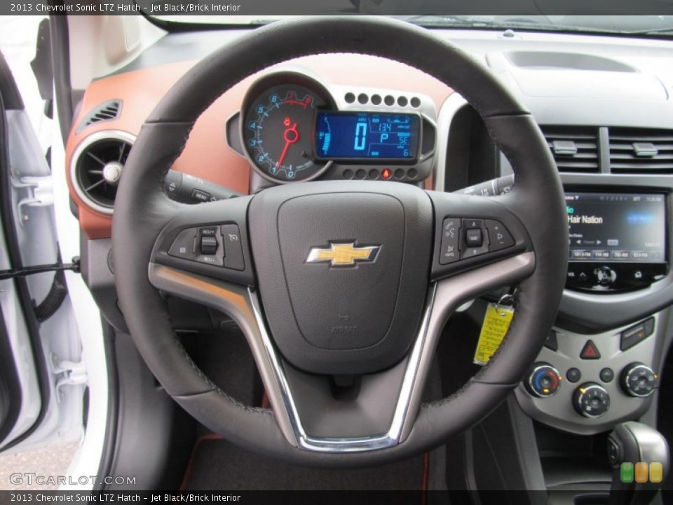 Jet Black/Brick Interior Steering Wheel for the 2013 Chevrolet Sonic LTZ Hatch #74636871