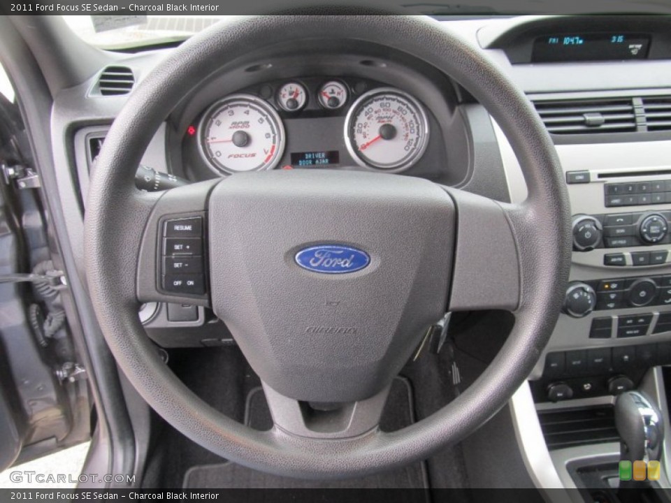 Charcoal Black Interior Steering Wheel for the 2011 Ford Focus SE Sedan #74672412