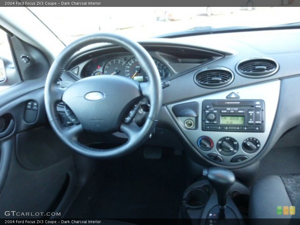 Dark Charcoal Interior Dashboard for the 2004 Ford Focus ZX3 Coupe #74744167