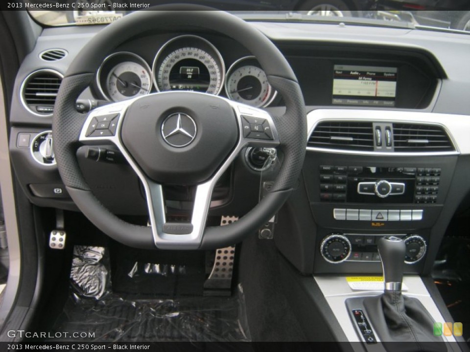 Black Interior Dashboard for the 2013 Mercedes-Benz C 250 Sport #74771598