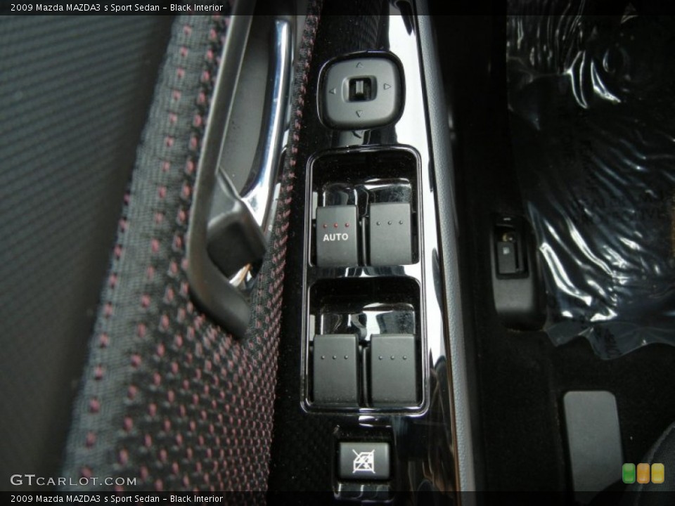 Black Interior Controls for the 2009 Mazda MAZDA3 s Sport Sedan #74791862