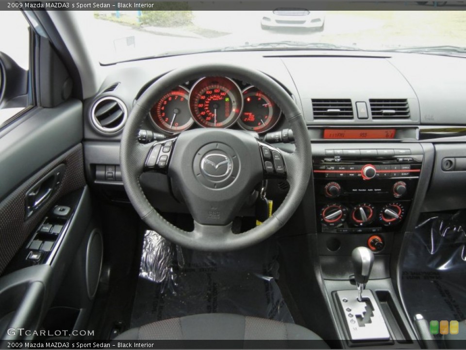 Black Interior Dashboard for the 2009 Mazda MAZDA3 s Sport Sedan #74791934