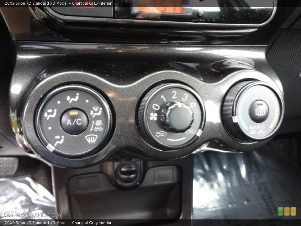 Charcoal Gray Interior Controls for the 2009 Scion xD  #74794673