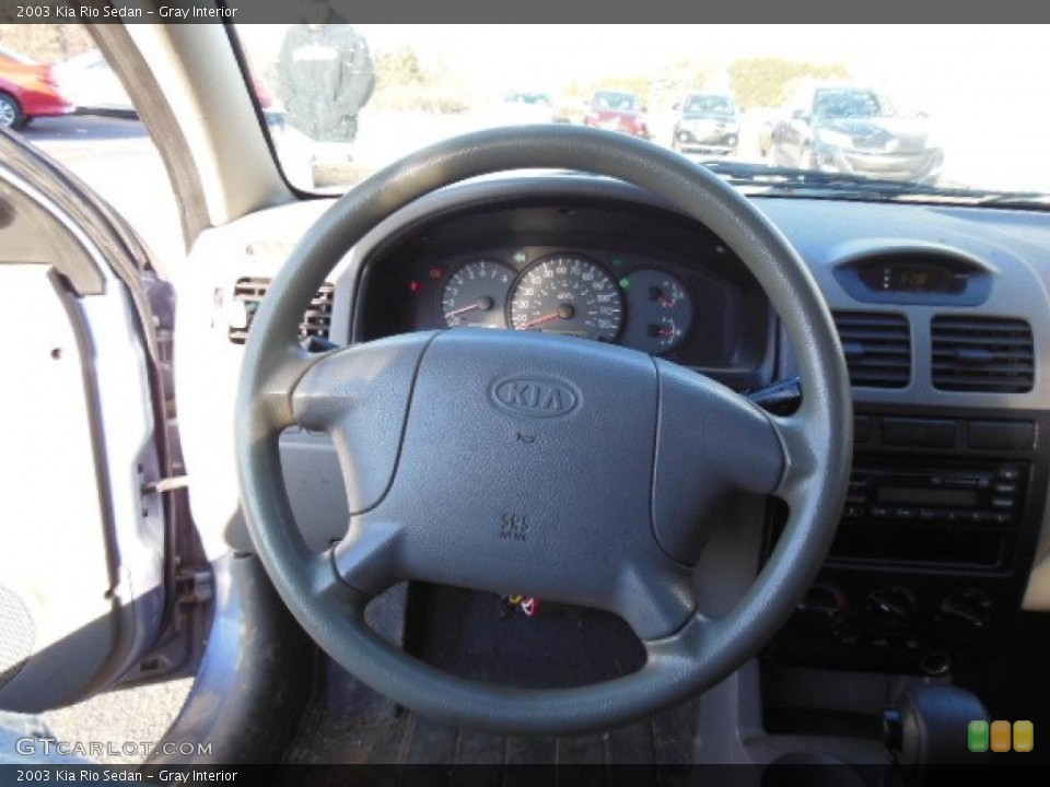 Gray Interior Steering Wheel for the 2003 Kia Rio Sedan #74799713