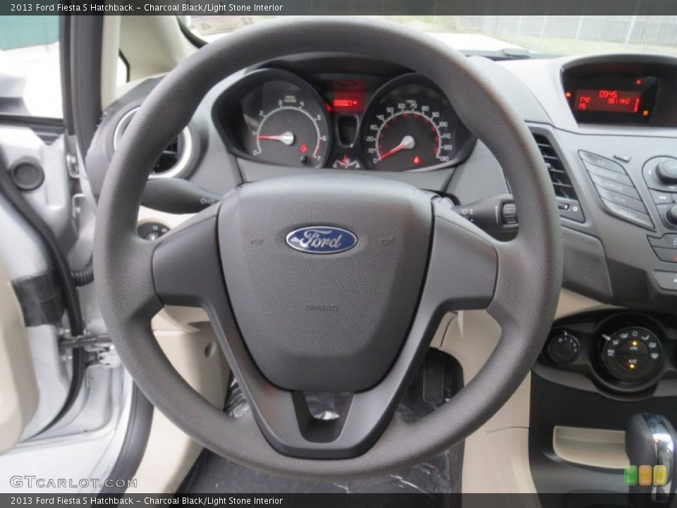 Charcoal Black/Light Stone Interior Steering Wheel for the 2013 Ford Fiesta S Hatchback #74839567