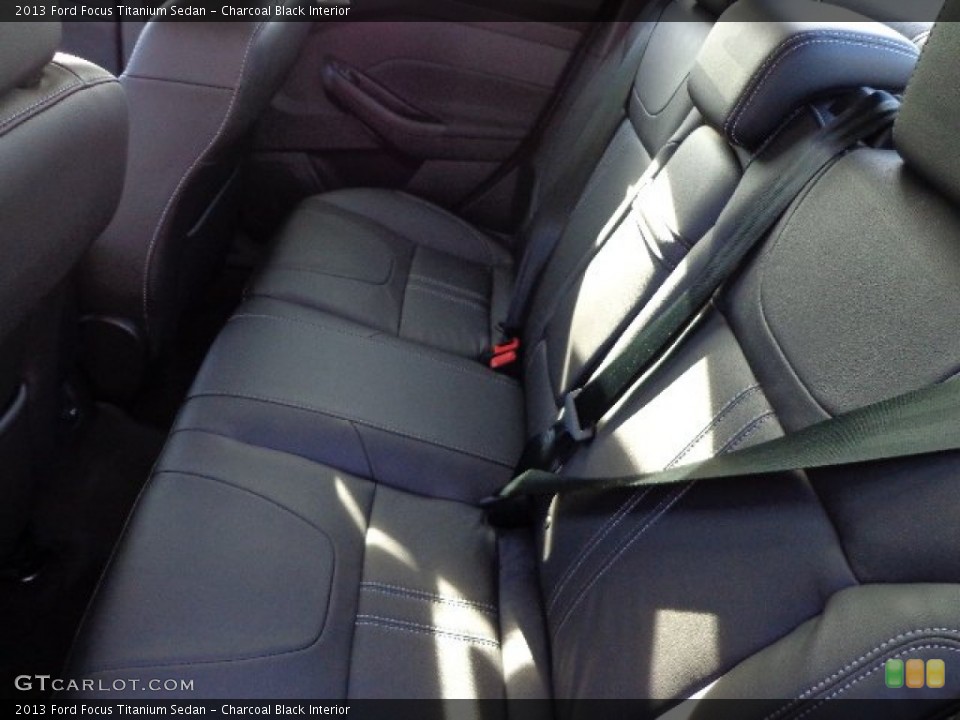 Charcoal Black Interior Rear Seat for the 2013 Ford Focus Titanium Sedan #74856437