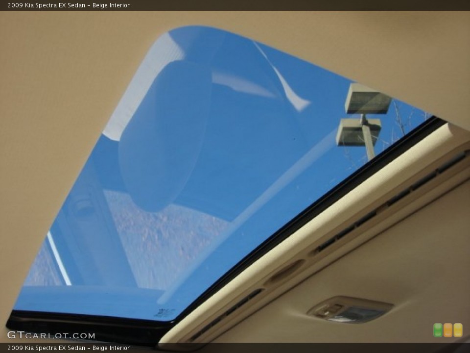 Beige Interior Sunroof for the 2009 Kia Spectra EX Sedan #74874230