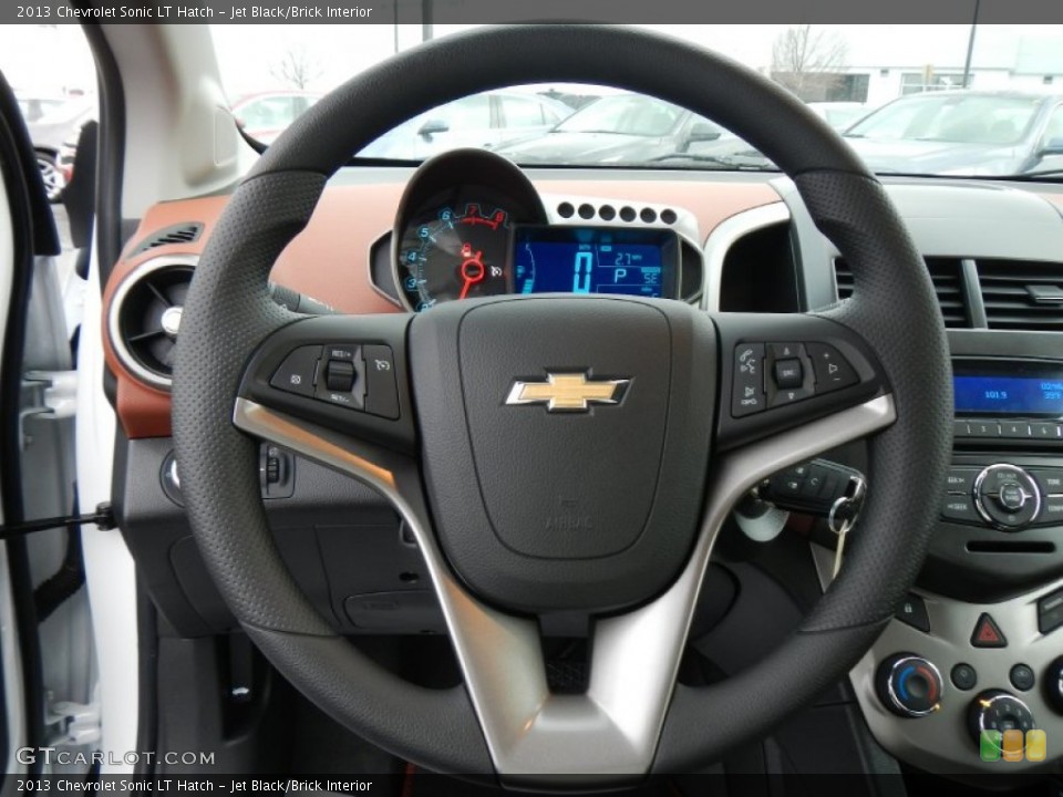 Jet Black/Brick Interior Steering Wheel for the 2013 Chevrolet Sonic LT Hatch #74886311