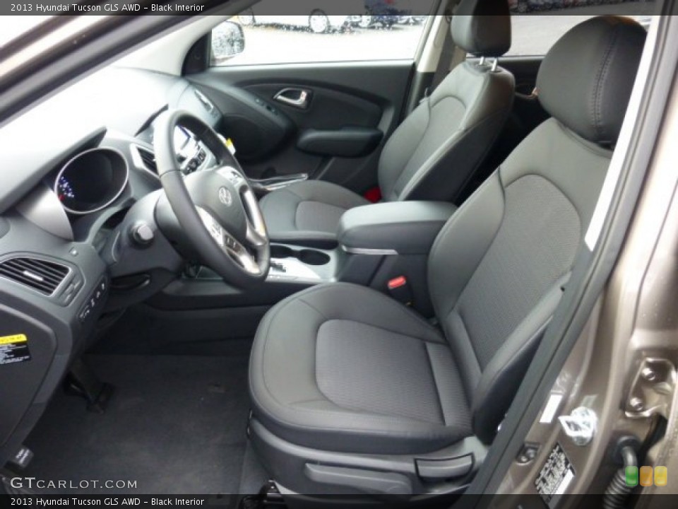 Black Interior Front Seat for the 2013 Hyundai Tucson GLS AWD #74888501