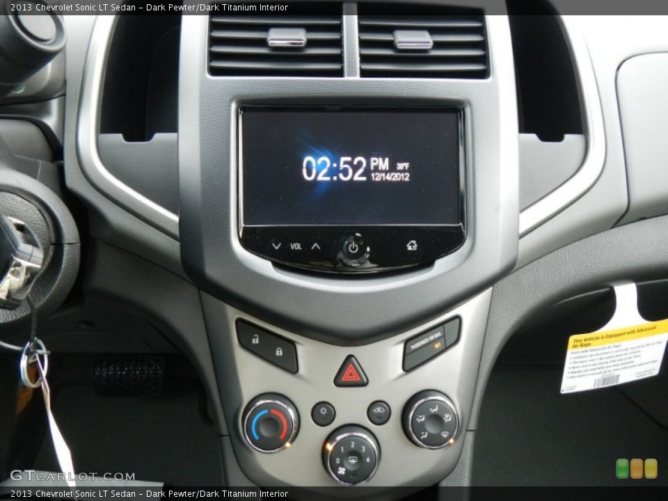 Dark Pewter/Dark Titanium Interior Controls for the 2013 Chevrolet Sonic LT Sedan #74889620