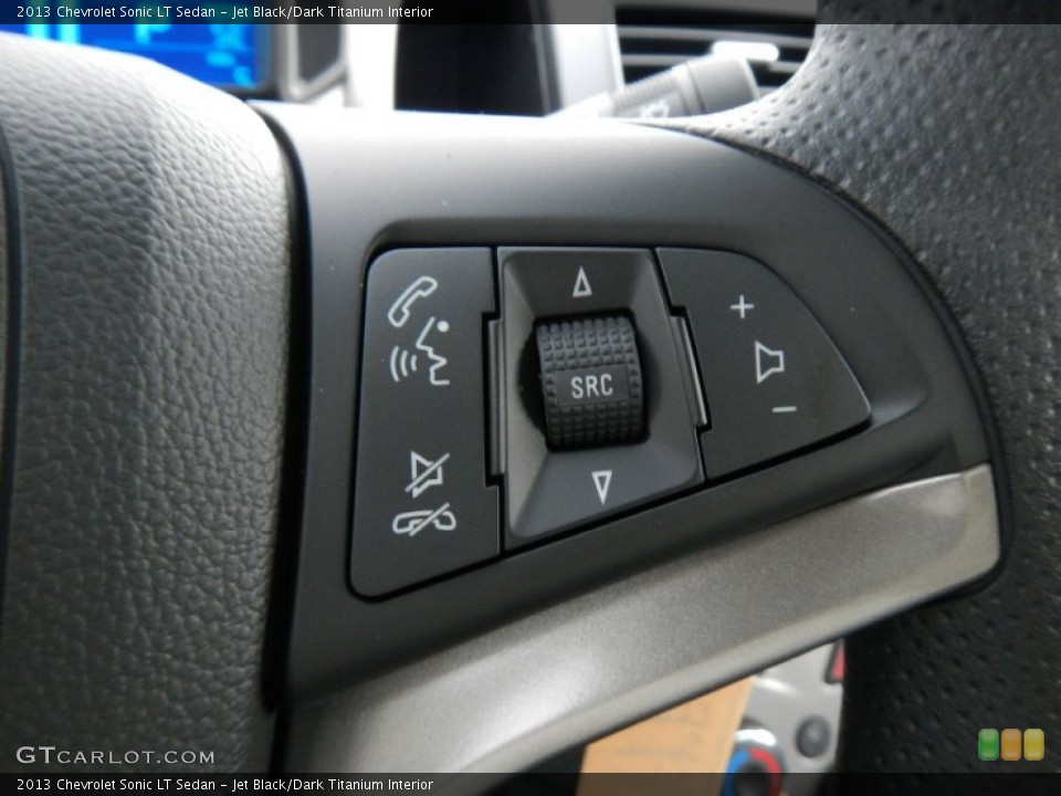 Jet Black/Dark Titanium Interior Controls for the 2013 Chevrolet Sonic LT Sedan #74890173