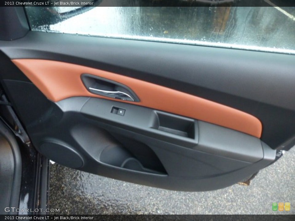 Jet Black/Brick Interior Door Panel for the 2013 Chevrolet Cruze LT #74902596