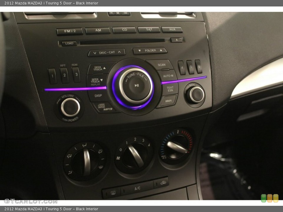 Black Interior Controls for the 2012 Mazda MAZDA3 i Touring 5 Door #74923242