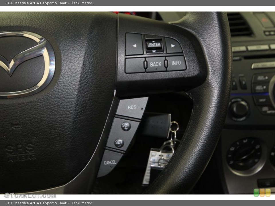 Black Interior Controls for the 2010 Mazda MAZDA3 s Sport 5 Door #74967214