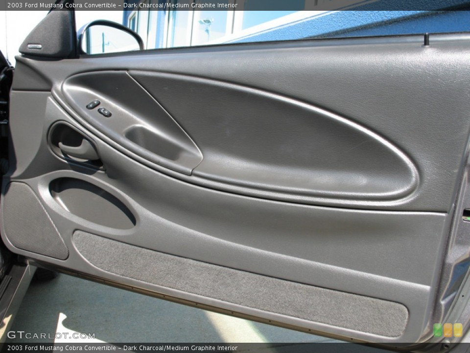 Dark Charcoal/Medium Graphite Interior Door Panel for the 2003 Ford Mustang Cobra Convertible #74983252