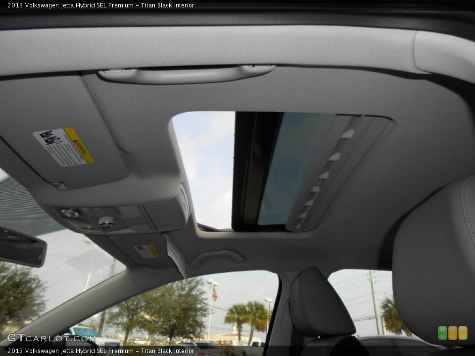 Titan Black Interior Sunroof for the 2013 Volkswagen Jetta Hybrid SEL Premium #75043029