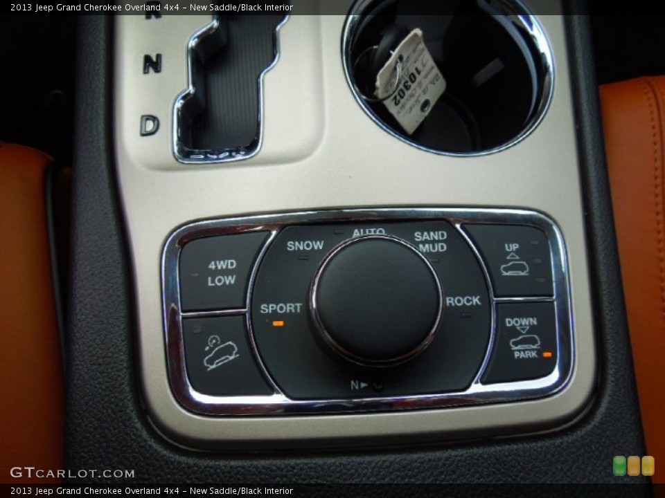 New Saddle/Black Interior Controls for the 2013 Jeep Grand Cherokee Overland 4x4 #75058565