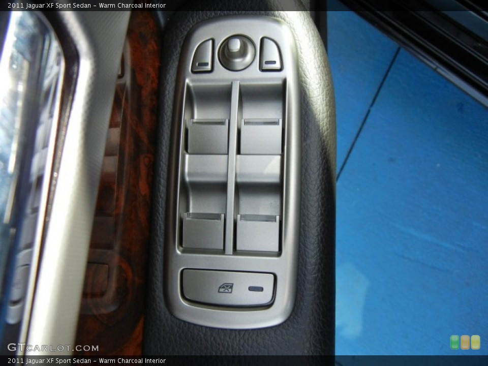 Warm Charcoal Interior Controls for the 2011 Jaguar XF Sport Sedan #75068318