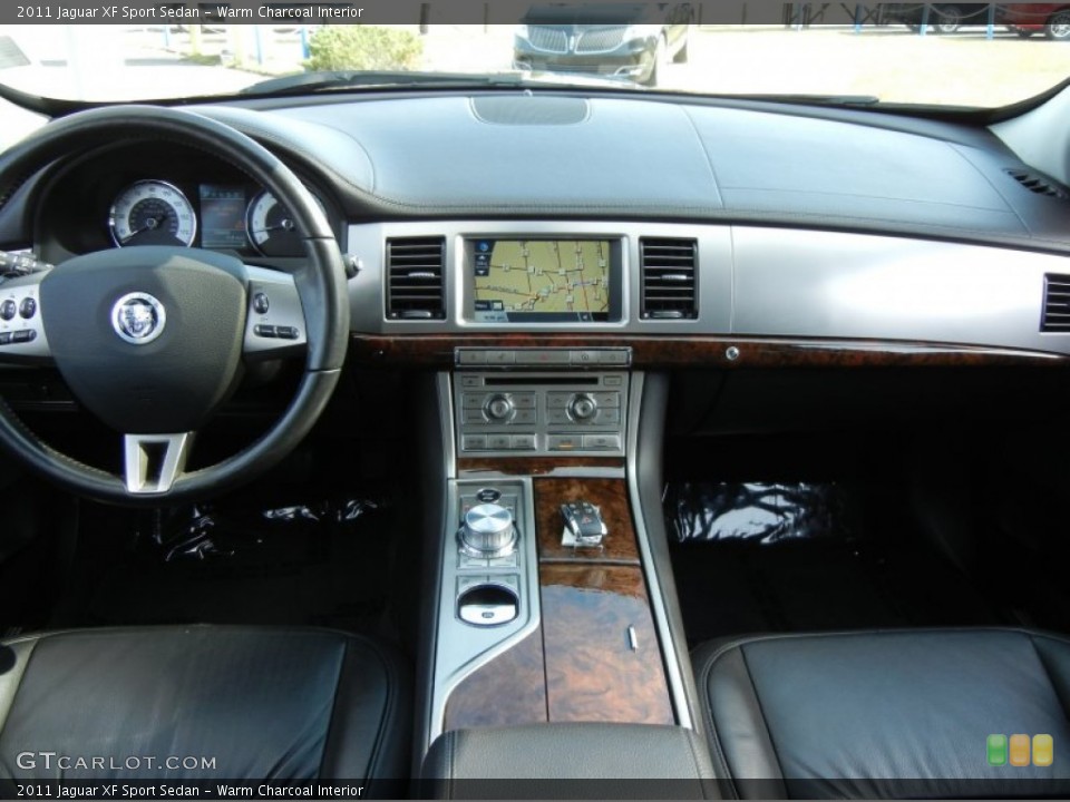 Warm Charcoal Interior Dashboard for the 2011 Jaguar XF Sport Sedan #75068394
