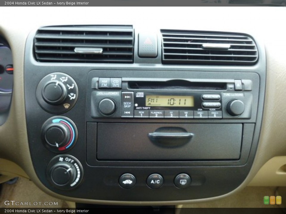 Ivory Beige Interior Controls for the 2004 Honda Civic LX Sedan #75080157