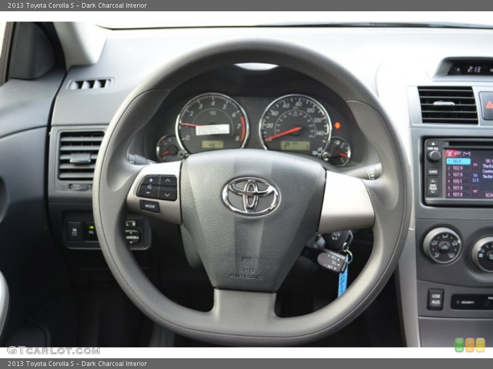 Dark Charcoal Interior Steering Wheel for the 2013 Toyota Corolla S #75234826