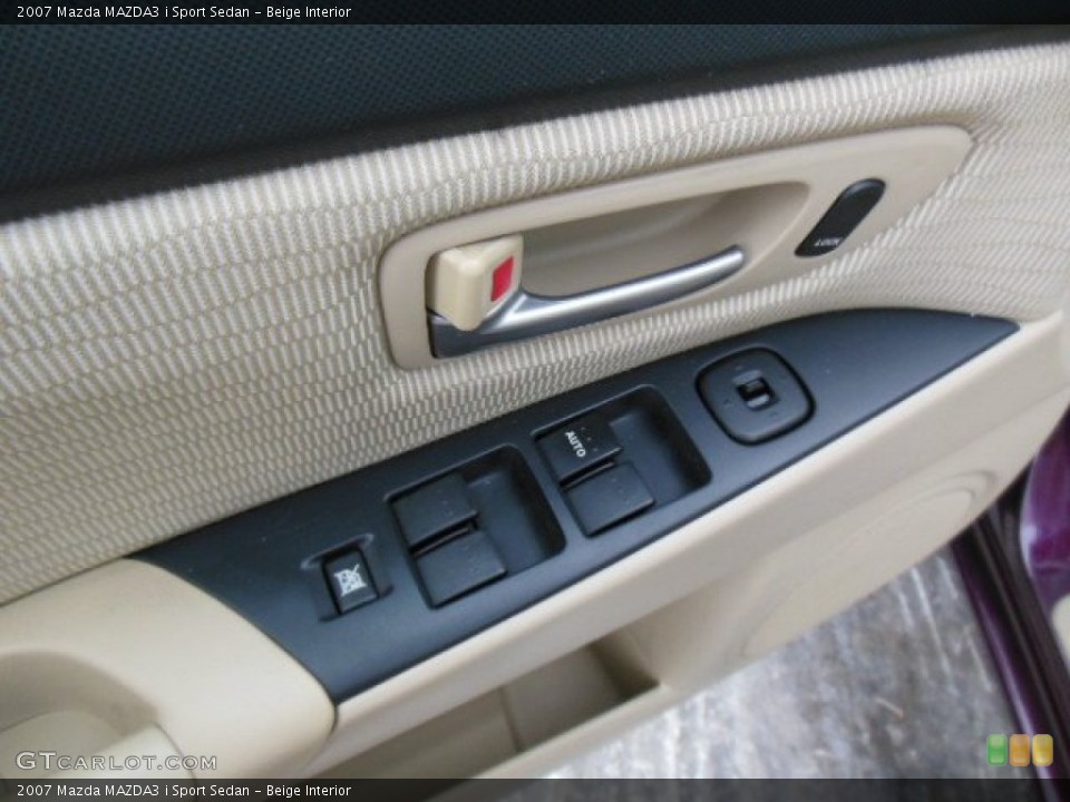 Beige Interior Controls for the 2007 Mazda MAZDA3 i Sport Sedan #75240693