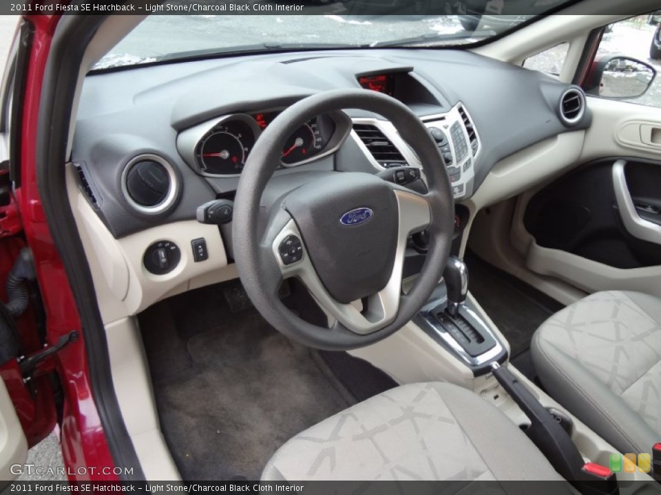 Light Stone/Charcoal Black Cloth Interior Prime Interior for the 2011 Ford Fiesta SE Hatchback #75284139