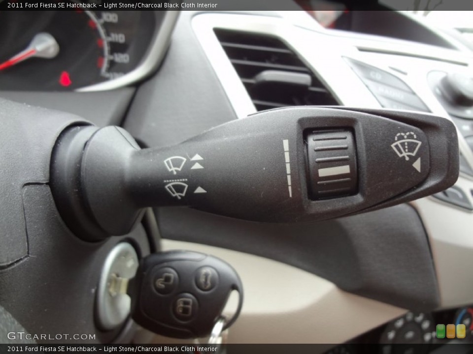 Light Stone/Charcoal Black Cloth Interior Controls for the 2011 Ford Fiesta SE Hatchback #75284259