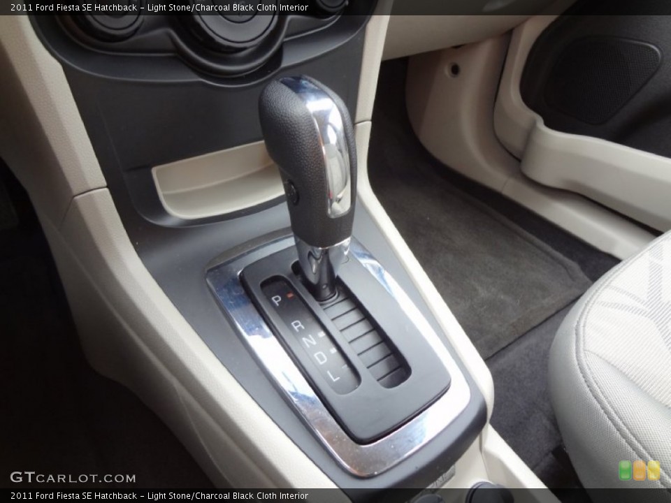 Light Stone/Charcoal Black Cloth Interior Transmission for the 2011 Ford Fiesta SE Hatchback #75284304