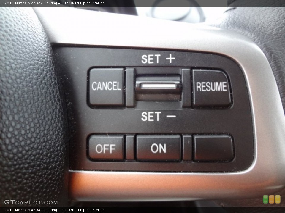 Black/Red Piping Interior Controls for the 2011 Mazda MAZDA2 Touring #75284532
