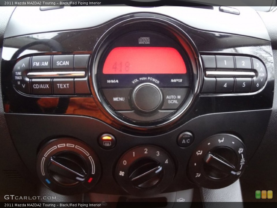 Black/Red Piping Interior Controls for the 2011 Mazda MAZDA2 Touring #75284550