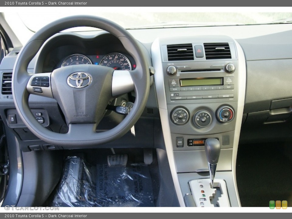 Dark Charcoal Interior Dashboard for the 2010 Toyota Corolla S #75306991